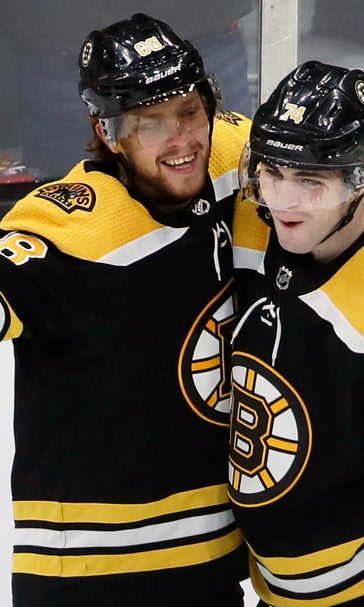 Pastrnak scores 4 goals to carry Bruins past Ducks 4-2